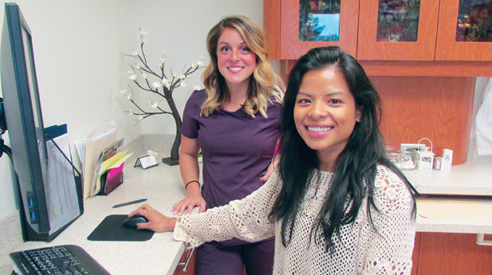 Dr. Salina Suy, right, is joined by her assistant, Kayla Almond, at her Business Park practice in Utica.