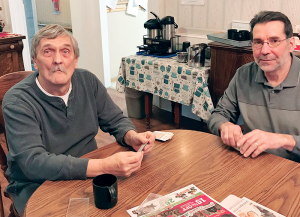 Anthony Joseph Franco, right, administrator of Mohawk Homestead, shares some recreational time with a resident.