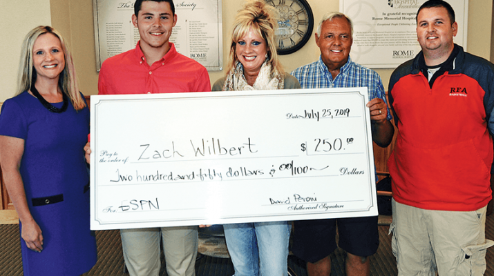 ESPN Radio Utica/Rome, recently presented a scholarship award to Zach Wilbert, Rome Free Academy class of 2019, for his exceptional athleticism and outstanding character on behalf of Rome Memorial Hospital, a supporter of high school sports broadcasts. The son of Bruce and Kathy Wilbert, he will major in sports management at Endicott College in the fall. From left, Rome Memorial Hospital Director of Business Development and Therapy Services Rena Hughes; Zach and his parents Kathy and Bruce Wilbert; and Nick Medicis, Rome Free Academy varsity basketball coach, celebrate the occasion. A scholarship was also awarded to Abby Edsall, a 2019 graduate of Oriskany High School. The daughter of John and Sheri Edsall, she has begun her college nursing program in South Carolina.