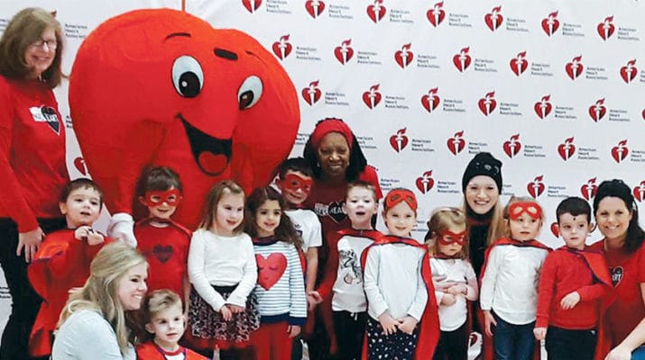 Four-year-old Peter Corigliano, of Rome, served as one of three Red Cap Ambassadors during the 2020 Rome Indoor Heart Walk held recently. Above, Corigliano’s class at King’s Kids Christian Preschool attended the walk as Team Peter. Pictured at front left are Peter and his mother, Ashley Corigliano, shown seated.