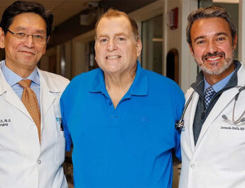 Patient Tim Andrews, 67, surrounded by his doctors at Mass General Brigham in Boston